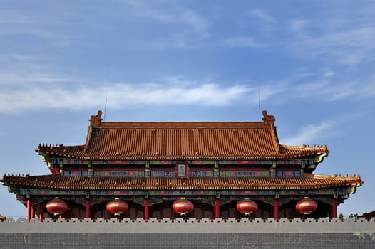 Palace roof with coloured glaze under blue sky