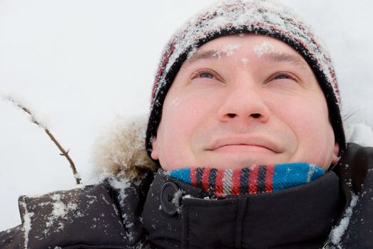 portrait of a man in a winter forest