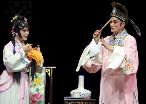 pretty chinese traditional opera actress with theatrical costume