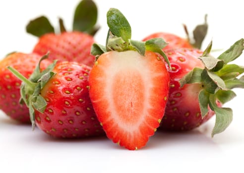 Strawberries closeup over white background