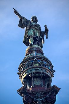 Columbus Monument, Monument A Colom, Columbus Pointing Statue, Barcelona, Catalonia, Spain.  At one end of the La Rambla, the monument was completed for the Universal Exposition in 1888 and is located at the spot where Columbus returned to Spain after his first trip to the Americas.