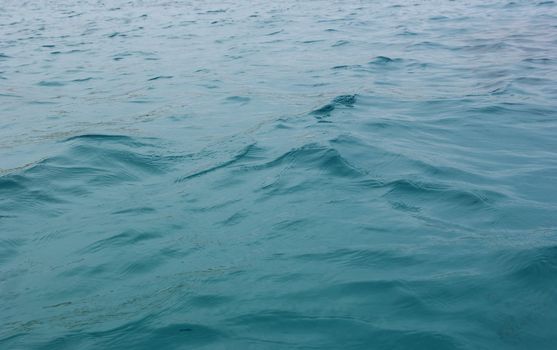 the background blue tropical sea water ripples