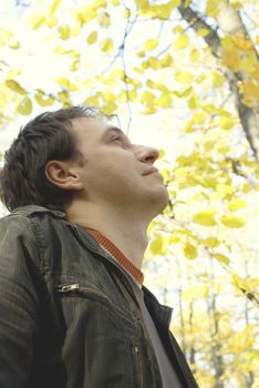 portrait of a man in the autumn forest