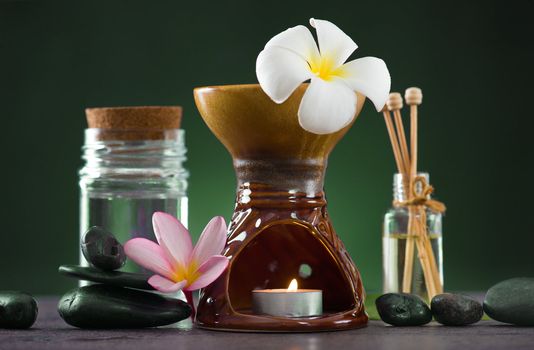 tropical frangipani aroma therapy spa health treatment with  and hot stones