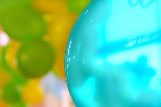 colorful balloon background background in blue green and yellow colors