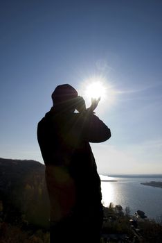 sun in the hands of men