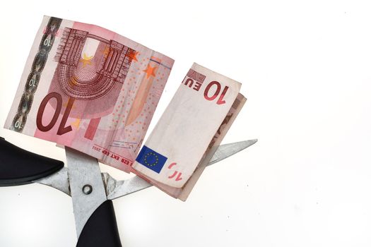 Ten Euros being sliced