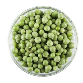 Fresh green peas in a glass bowl isolated on white