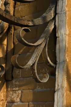 Metal forged brackets, as ornaments of old merchants' mansions