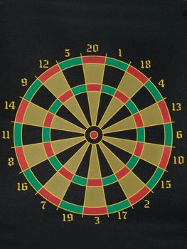 multicolored dart board with numbers around the outside