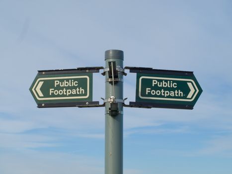 Two Public footpath signs pointing left and right