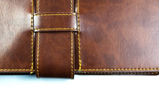 brown notebook on white background