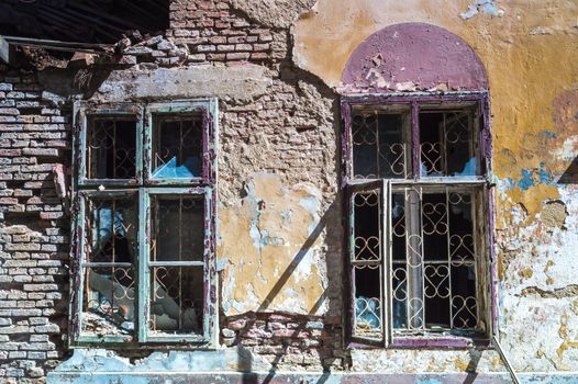 broken windows, detail of a deserted house