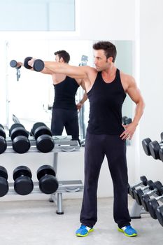 man with weight training equipment on sport gym club