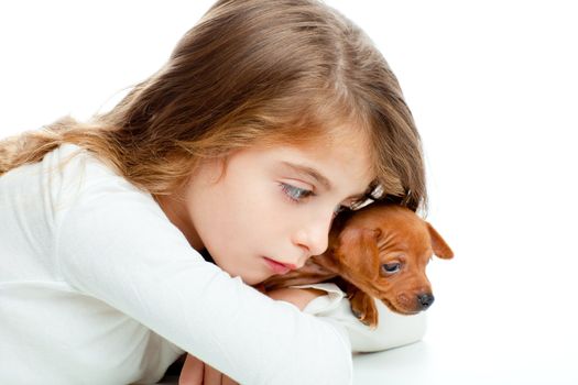 brunette kid girl with mini pinscher pet mascot dog on white background
