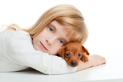 blond kid girl with mini pinscher pet mascot dog on white background