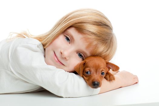 blond kid girl with mini pinscher pet mascot dog on white background