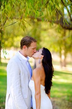 couple kissing in honeymoon outdoor autumn park