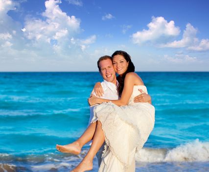 couple in love hug in blue sea vacations in Spain