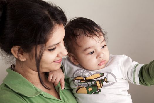 Indian Happy mother and baby looking each other