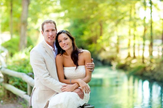 couple of lovers in love in park river outdoors hug