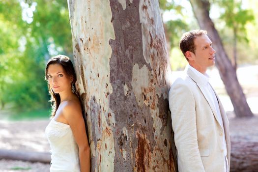 Couple happy in love at park green outdoor tree