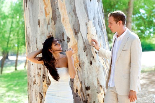 Couple happy in love at park green outdoor tree