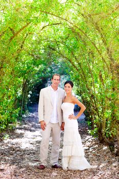 bride just married couple in love at outdoor green park