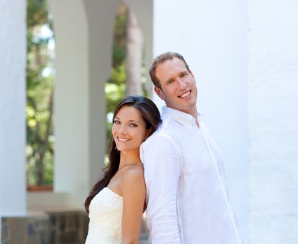 bride couple just married in mediterranean arches