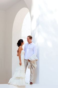 bride couple just married in mediterranean arches