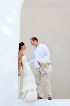 bride couple just married in mediterranean arches