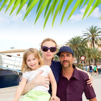 Family tourist in Ibiza town port in summer