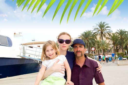 Family tourist in Ibiza town port in summer