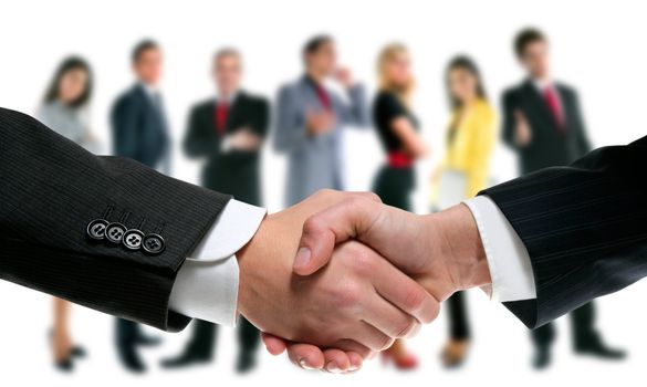 business people handshake with company team in background