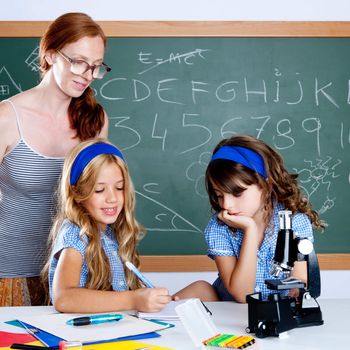 kids students with nerd teacher woman at school classroom