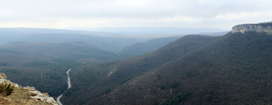 Movement of the clouds on the mountain. Crimea. Ukraine. Plateau Baba-Dag. Cave city Mangup-Kale. XIV-XVIII centuries
