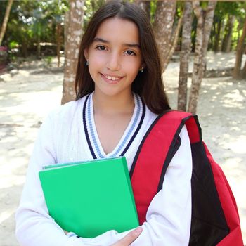 hispanic latin mexican teenager student girl with backpack in the park