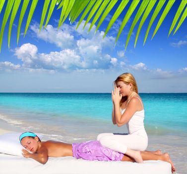 Caribbean beach massage meditation shiatsu woman in paradise
