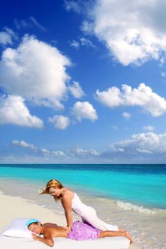 Caribbean beach massage shiatsu waist pressure woman outdoor paradise