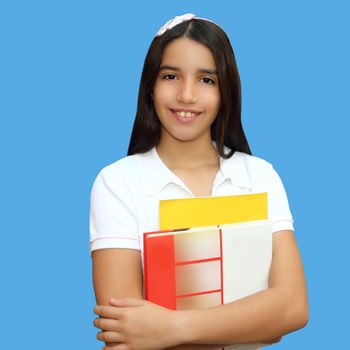 brunette teen indian latin student holding school books isolated on blue