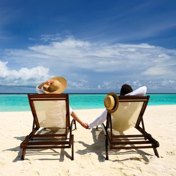 Couple on a tropical beach at Maldives