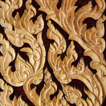 Pattern of Thai art on wood background