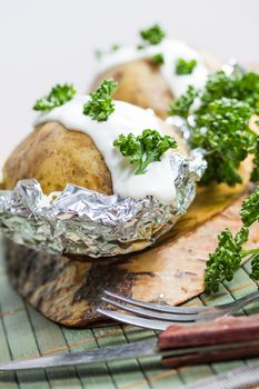 fresh baked potatoe with sour cream