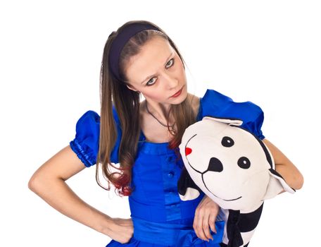 the girl in blue dress with toy cat isolated on white