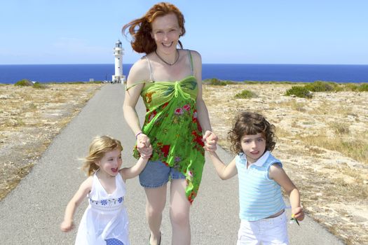 mother two daughter sister running happy formentera vacation Barbaria