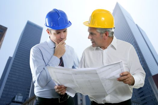 architect engineer two expertise team plan talking hardhat skyscraper buildings