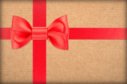 red bow and ribbon over wrapped gift