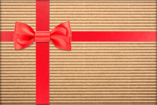 red bow and ribbon over wrapped gift