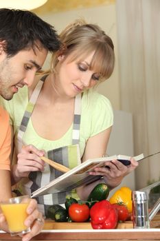 Couple following recipe