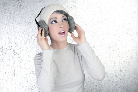 futuristic fashion future woman hearing music silver headphones